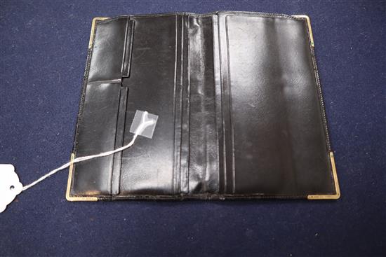 A 1960s 9ct gold mounted black leather wallet by Asprey & Co Ltd, London, 1967, 17cm.